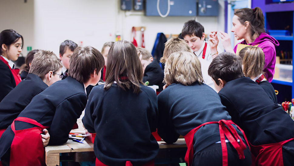 Teacher engaged with students